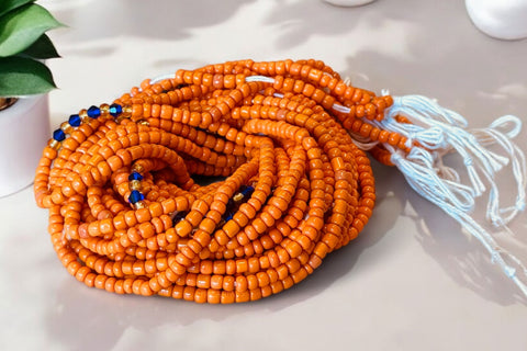 (Belangrijk: graag lezen) Waist Beads / Afrikaanse Heupketting - Oranje (Traditioneel niet-elastisch koord) 