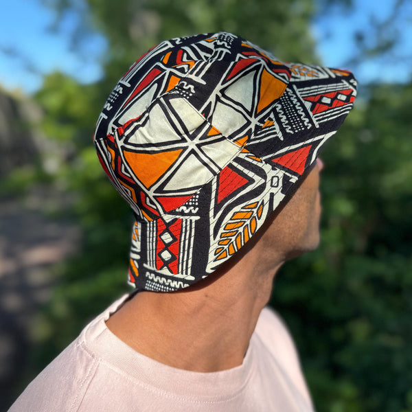 Bucket hat / Vissershoedje met Afrikaanse print - Rood & Oranje Bogolan Symbols - Kinderen & Volwassenen (Unisex)